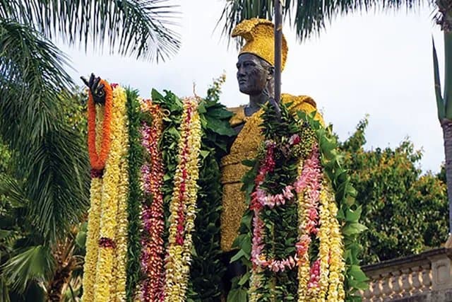 King Kamehameha statue draped with flower leis, Honolulu